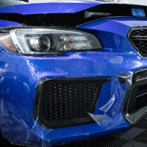 ppf installation of blue subaru front bumper