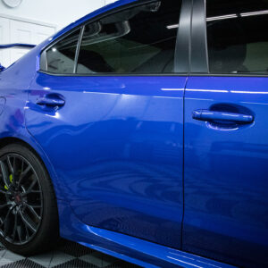 blue subaru car side body